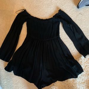 “Subdued” small black romper